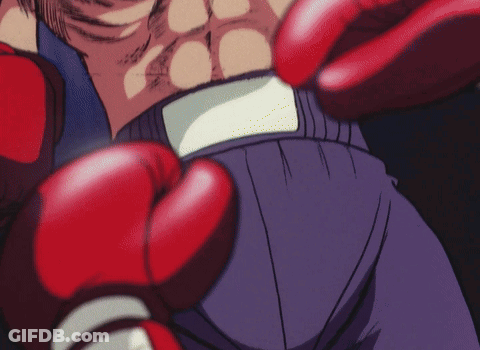 Cartoon Man With Red Boxing Glove GIF