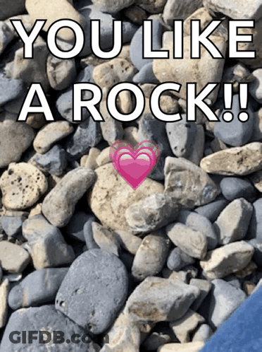 Cartoon Meerkat Sitting In Grass With Hearts GIF