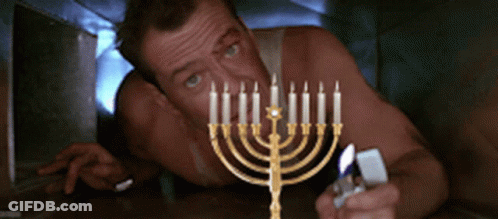 Cartoon Menorah With Lit Candles GIF