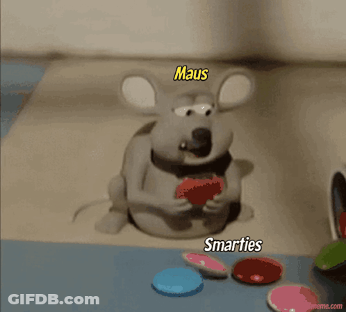 Cartoon Mouse Eating With Maus And Smarties GIF