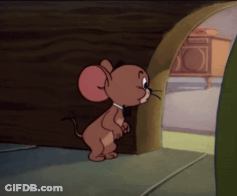 Cartoon Mouse In Bow Tie Next To Doorway GIF