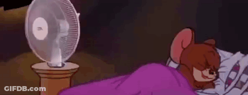 Cartoon Mouse Sleeping In Bed With Fan GIF