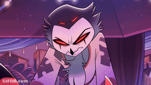 Cartoon Owl With Red Eyes Sitting On Table GIF