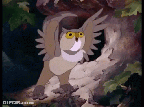 Cartoon Owl With Yellow Eyes On Tree Branch GIF