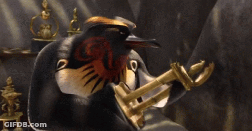 Cartoon Penguin Holding Trophy GIF