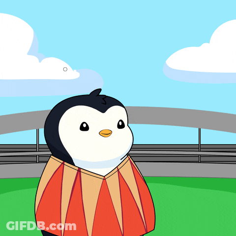Cartoon Penguin In Red And Yellow Top GIF