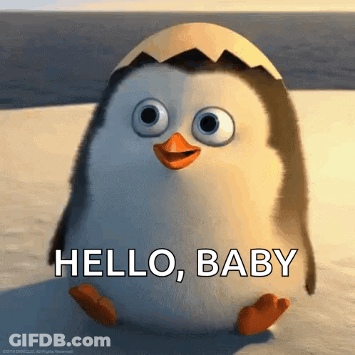 Cartoon Penguin Sitting On Beach Saying Hello Baby GIF