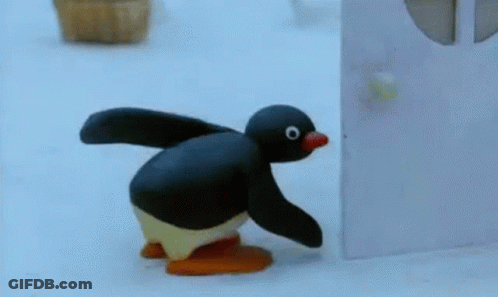 Cartoon Penguin Walking In Snow GIF