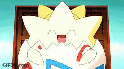 Cartoon Pokémon Sitting In Box Smiling GIF
