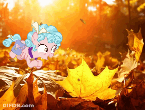 Cartoon Pony Laying On Autumn Leaves GIF