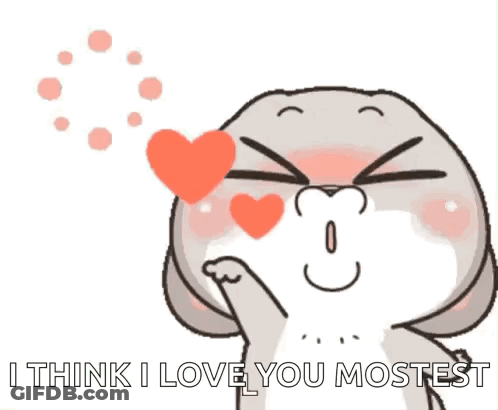 Cartoon Rabbit Blowing Heart Saying I Think I Love You Mostest GIF