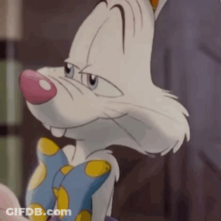 Cartoon Rabbit In Blue And Yellow Polka Dot Tie GIF
