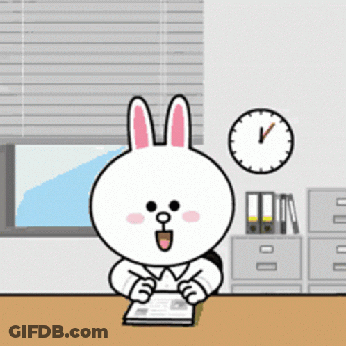Cartoon Rabbit Sitting At Desk With Book And Clock GIF