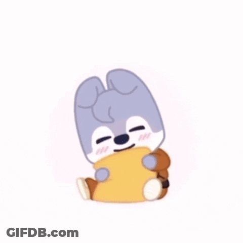 Cartoon Rabbit Sitting Holding Bread GIF