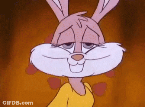 Cartoon Rabbit Smiling In Yellow Shirt GIF