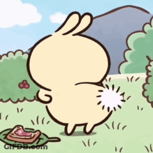 Cartoon Rabbit Standing In Grass GIF