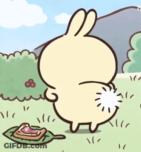 Cartoon Rabbit With White Tail Standing In Grass GIF