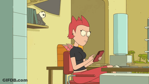 Cartoon Red-Haired Character Sitting At Desk GIF