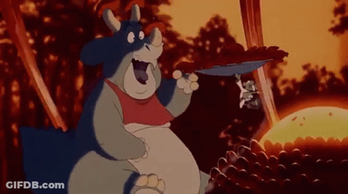 Cartoon Rhinoceros Holding Mushroom GIF