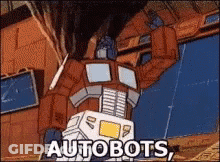 Cartoon Robot Saying Autobots GIF