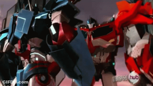 Cartoon Robot With Purple Wing On Chest GIF