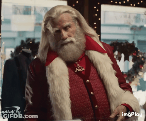 Cartoon Santa Claus Blowing A Kiss GIF