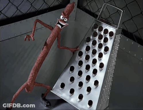 Cartoon Sausage Standing Next To Grater GIF