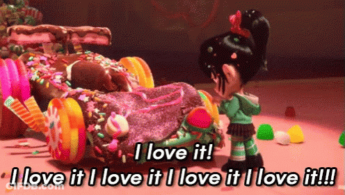 Cartoon Saying I Love It Next To Car Covered In Candy GIF