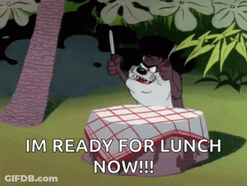 Cartoon Sitting At Table Holding Knife Saying Im Ready For Lunch Now GIF