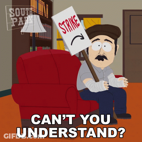 Cartoon Sitting In Chair Holding Strike Sign GIF
