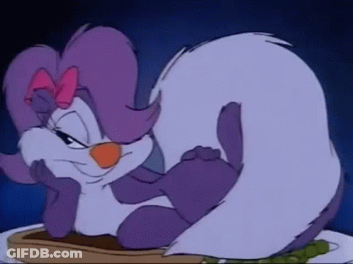 Cartoon Skunk Sitting On Plate With Toast GIF