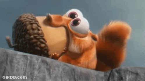 Cartoon Squirrel Eating Acorn GIF