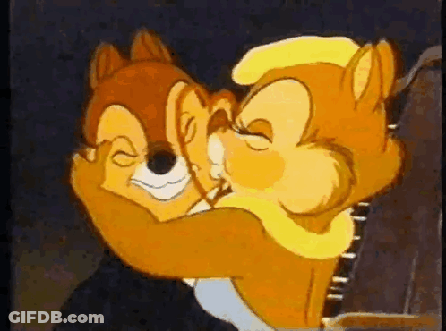 Cartoon Squirrels Hugging In Dark Room GIF