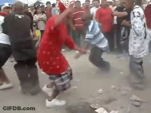 Cartoon Standing In Grassy Field With Chola Mais GIF