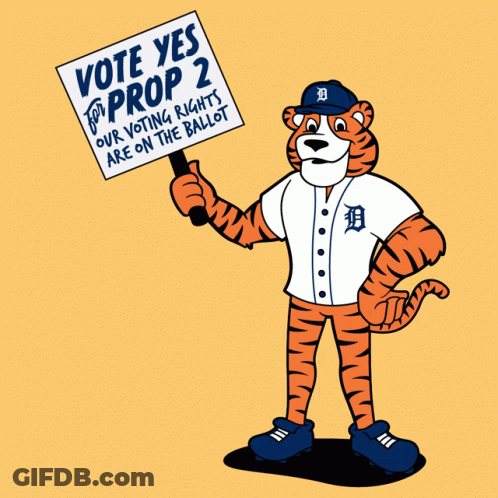 Cartoon Tiger Holding Vote Yes For Prop 2 Sign GIF