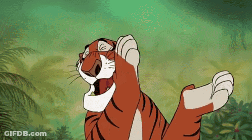 Cartoon Tiger Laying Down In Jungle With Mouth Open GIF