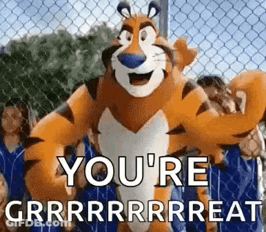 Cartoon Tiger Standing In Front Of Chain Link Fence GIF