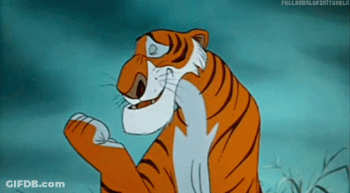 Cartoon Tiger Standing In Grass With Paws Up Smiling GIF