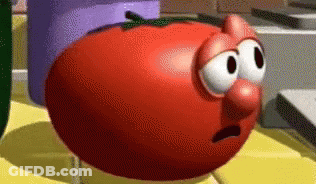 Cartoon Tomato With Big Nose On Table GIF