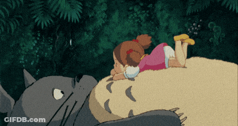 Cartoon Totoro Sitting On Hill GIF