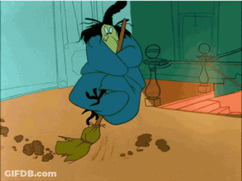 Cartoon Witch Holding Broom GIF