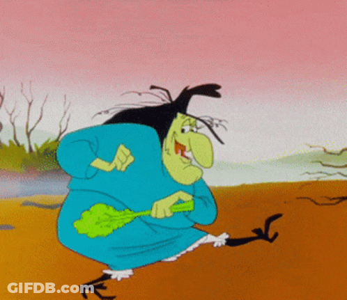 Cartoon Witch Holding Green Stick GIF