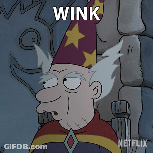 Cartoon Wizard Saying Wink GIF