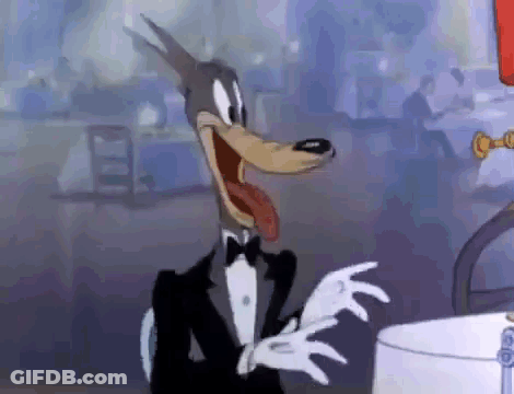 Cartoon Wolf In Tuxedo And White Gloves Making Funny Face GIF