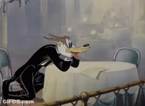 Cartoon Wolf Sitting With Mouth Open GIF