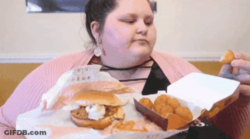 Cartoon Woman Holding Plate Of Sandwiches GIF