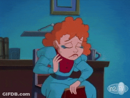 Cartoon Woman Sitting At Desk With In2 TV GIF