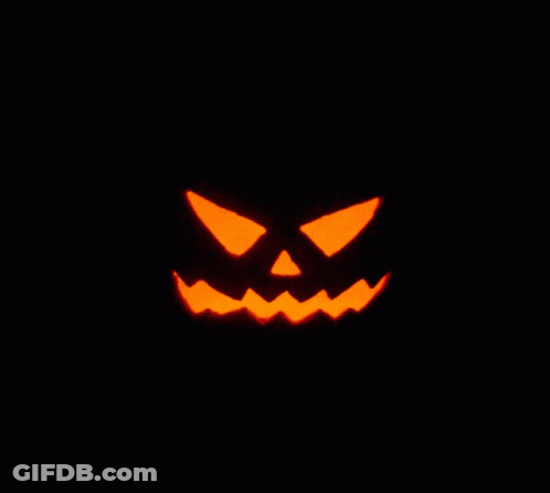 Carved Halloween Pumpkin With Glowing Face GIF