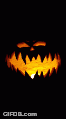 Carved Halloween Pumpkin With Glowing Mouth GIF