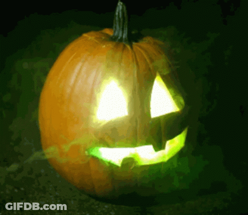 Carved Pumpkin With Green Light GIF